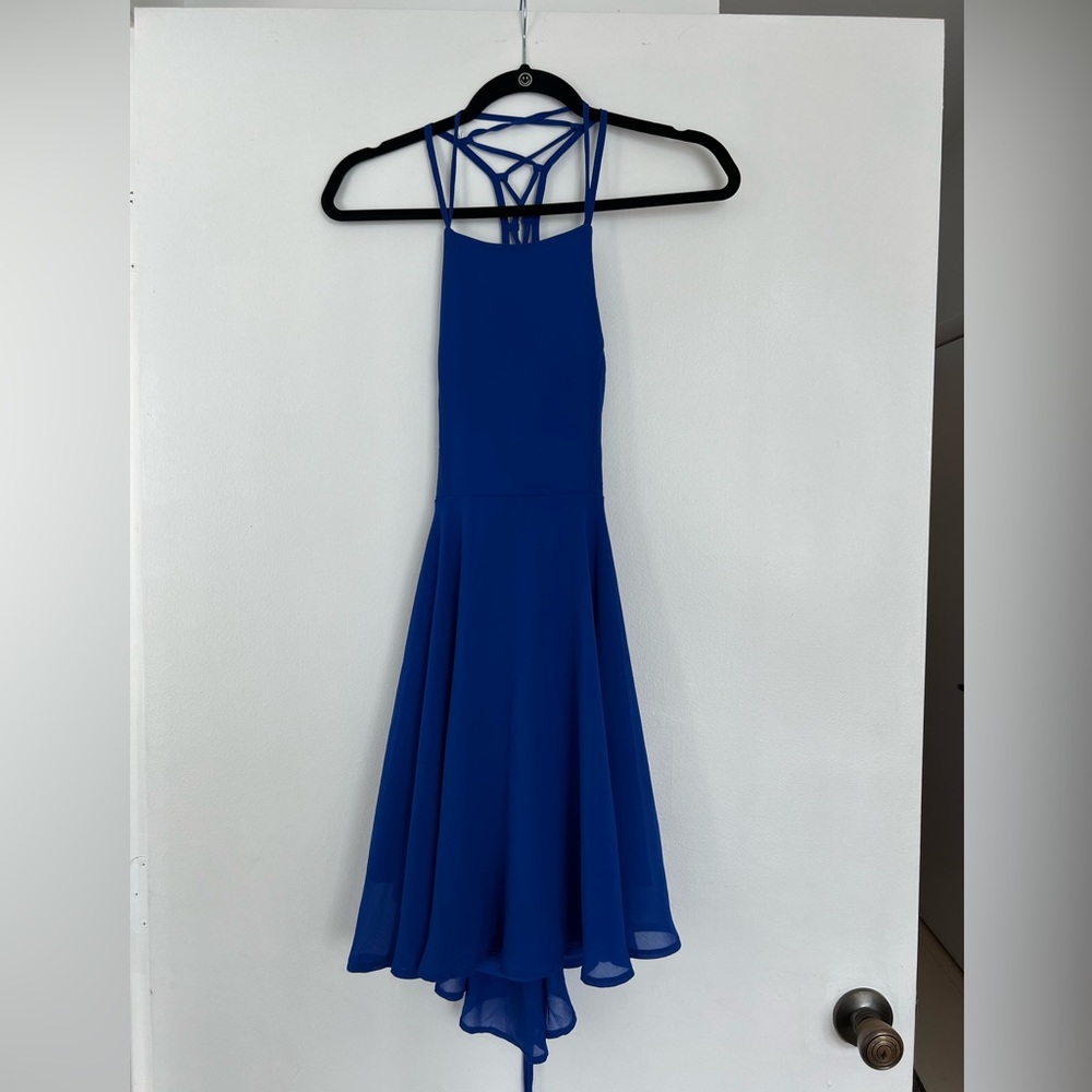 Royal blue flowy dress with fun cut out back. - Picture 1 of 4